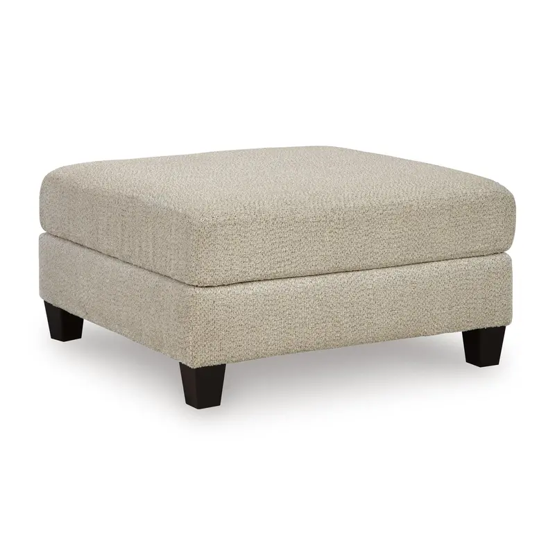 Benchcraft Steelwater Retreat Fabric Ottoman – Contemporary Accent 1